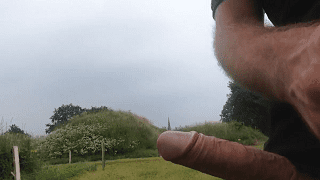 Man with big penis head jerks and splurts outside